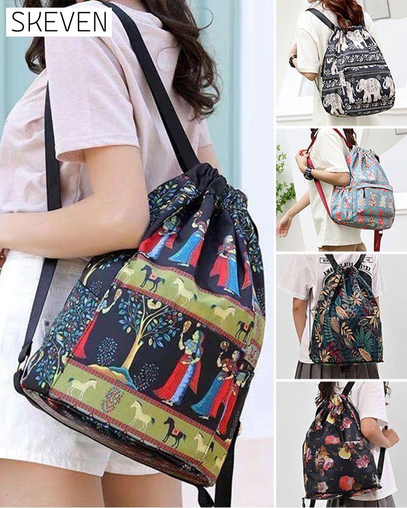 Schultertasche im Ethno-Stil mit Kordelzug