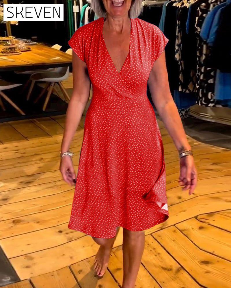 robe à pois à manches courtes et col en V