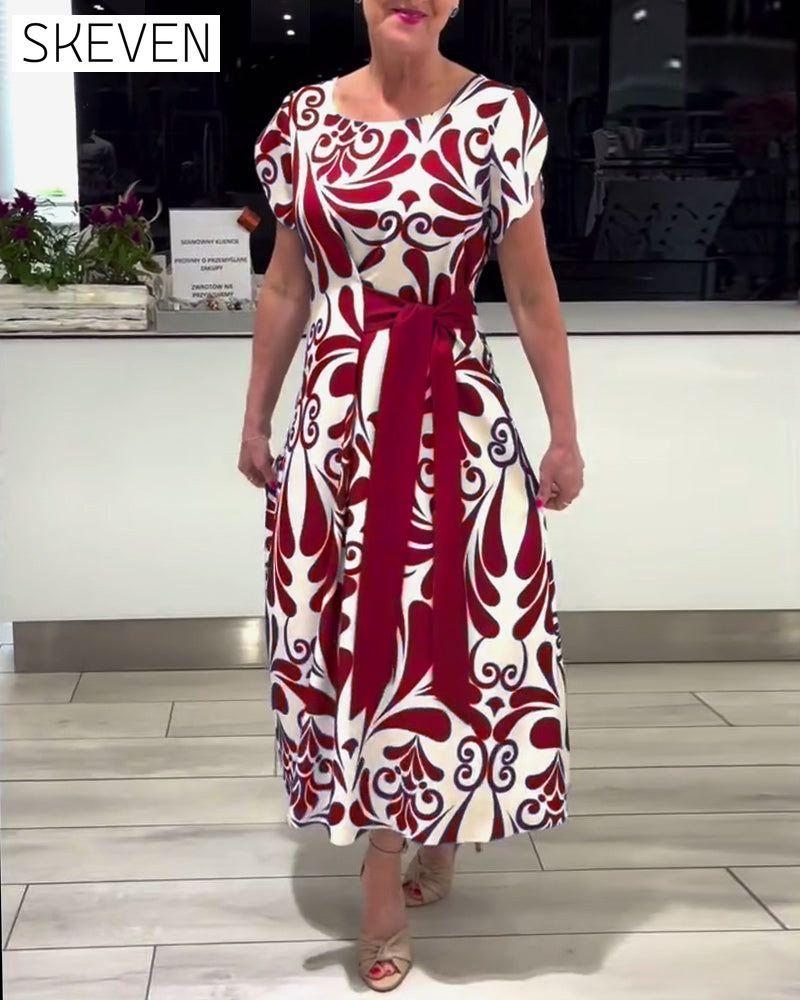 Elegantes Kurzarmkleid mit Kontrastprint