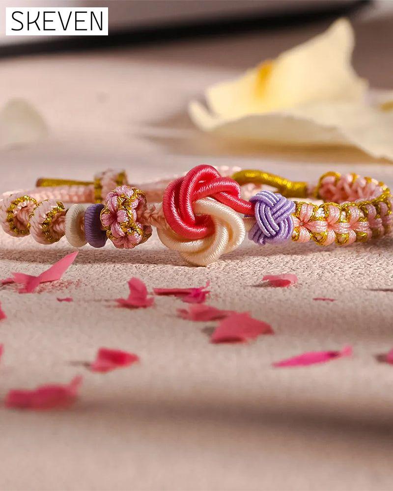 Bracelet with knot of peach blossoms