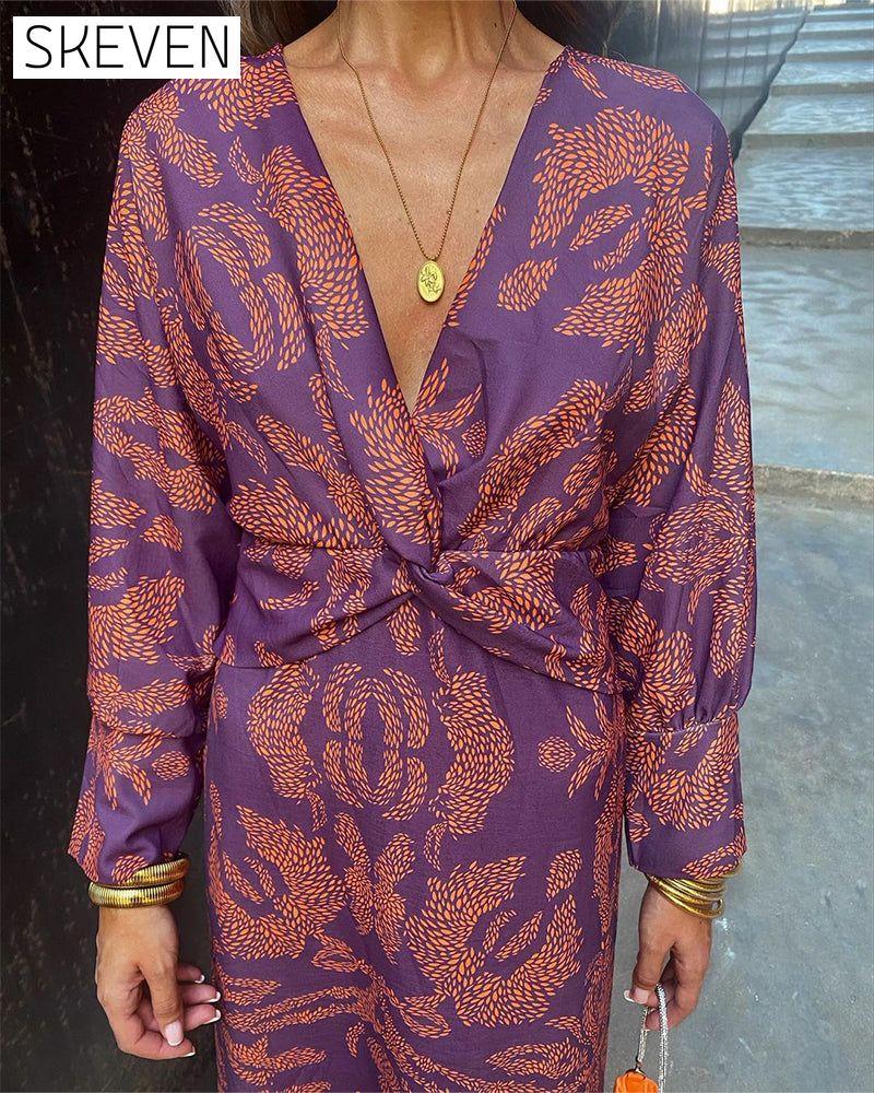 Elegantes Vintage-Kleid mit Print, V-Ausschnitt und langen Ärmeln