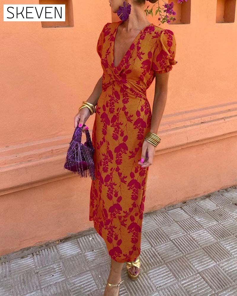 Elegantes A-Linien-Kleid mit Blätterprint, tiefem V-Ausschnitt und Puffärmeln