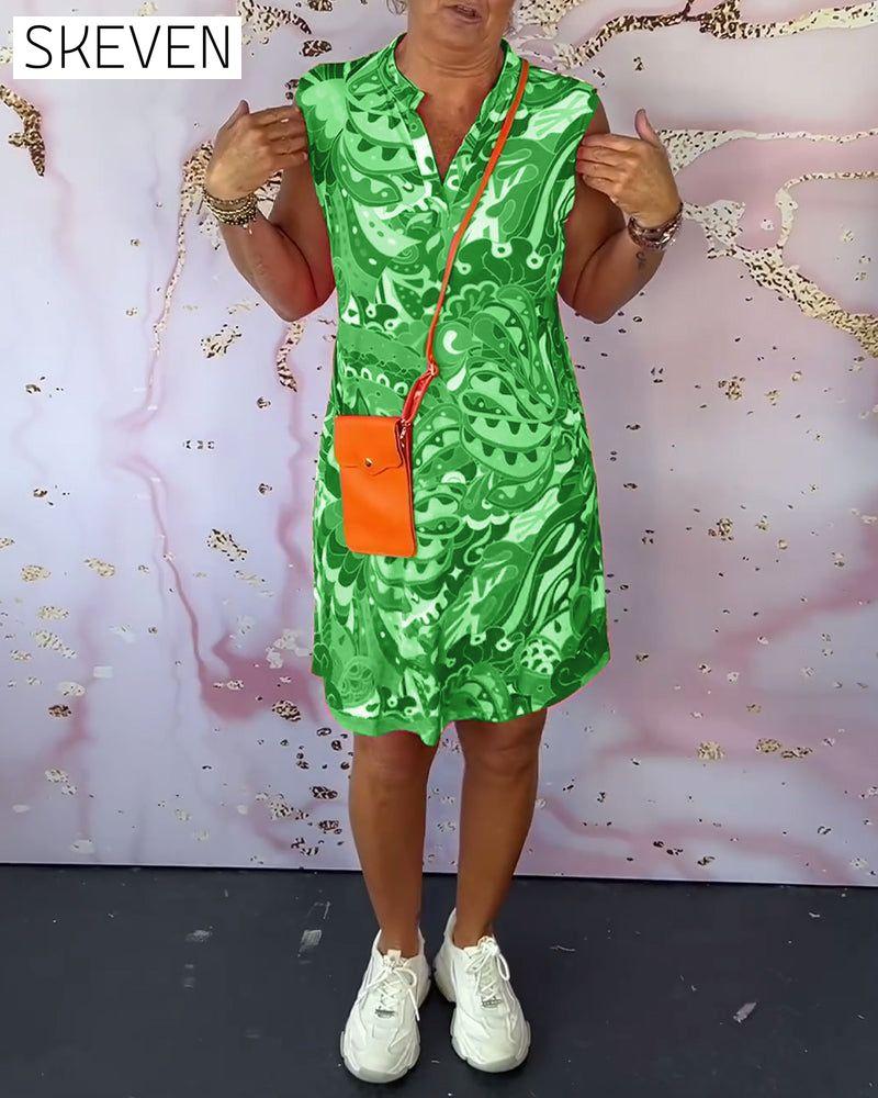 Elegantes, ärmelloses Kleid mit Print und V-Ausschnitt