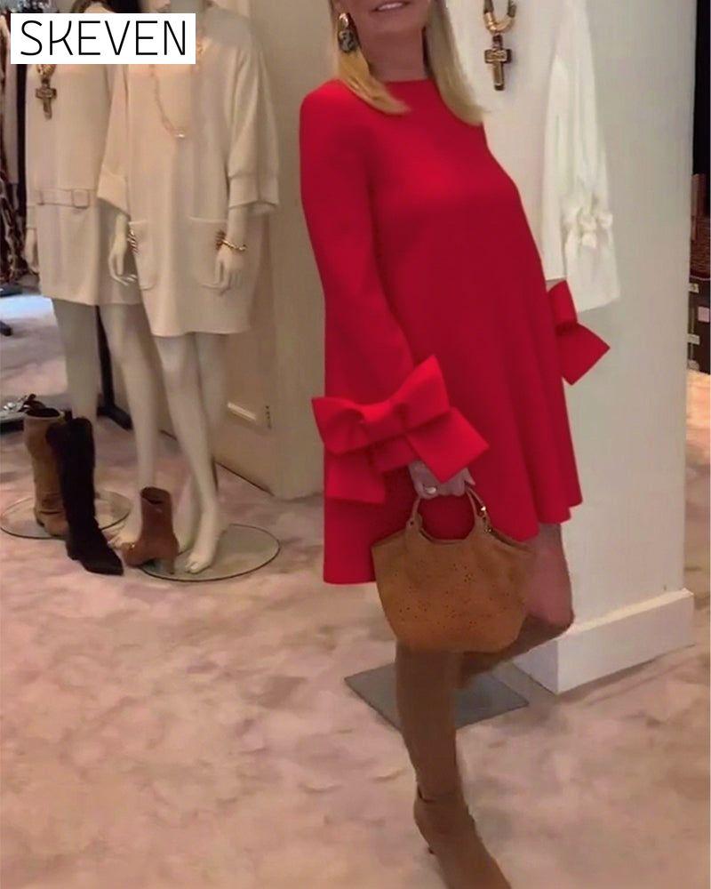 Modisches Kleid mit Rundhalsausschnitt und Schleifenärmeln