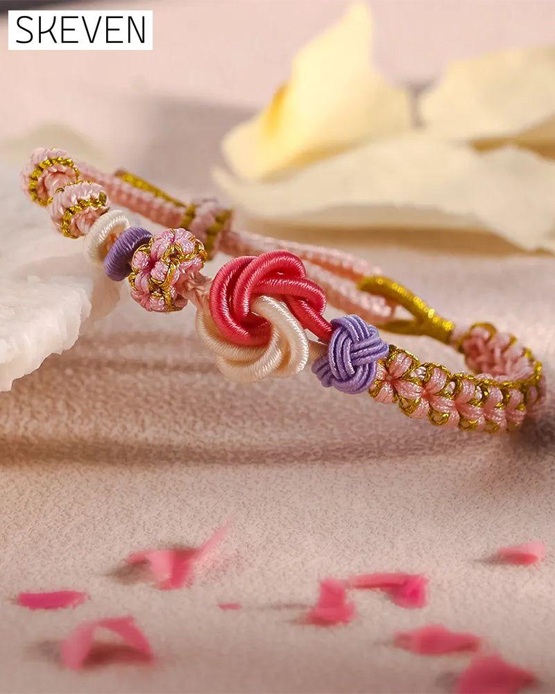 Bracelet with knot of peach blossoms
