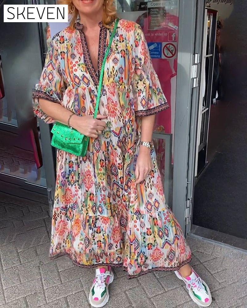 Elegantes, bedrucktes langes Kleid mit V-Ausschnitt