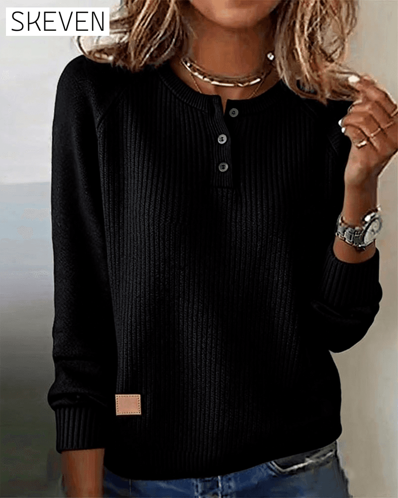 Stilvoller Pullover mit Raglanärmeln und Knopfleiste