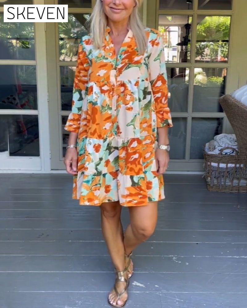 Elegantes Kleid mit V-Ausschnitt und Blumenmuster