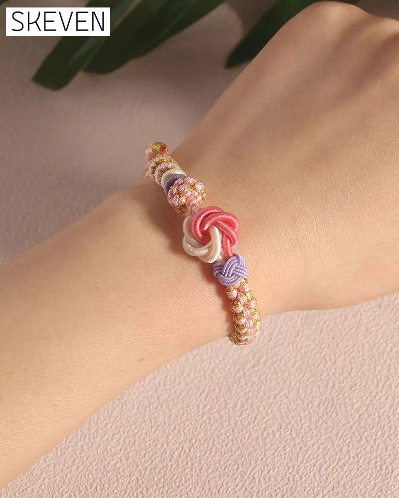 Bracelet with knot of peach blossoms