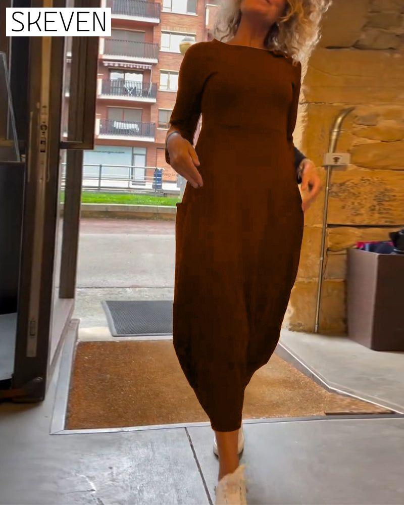 Solid color round neck long sleeve pocket dress