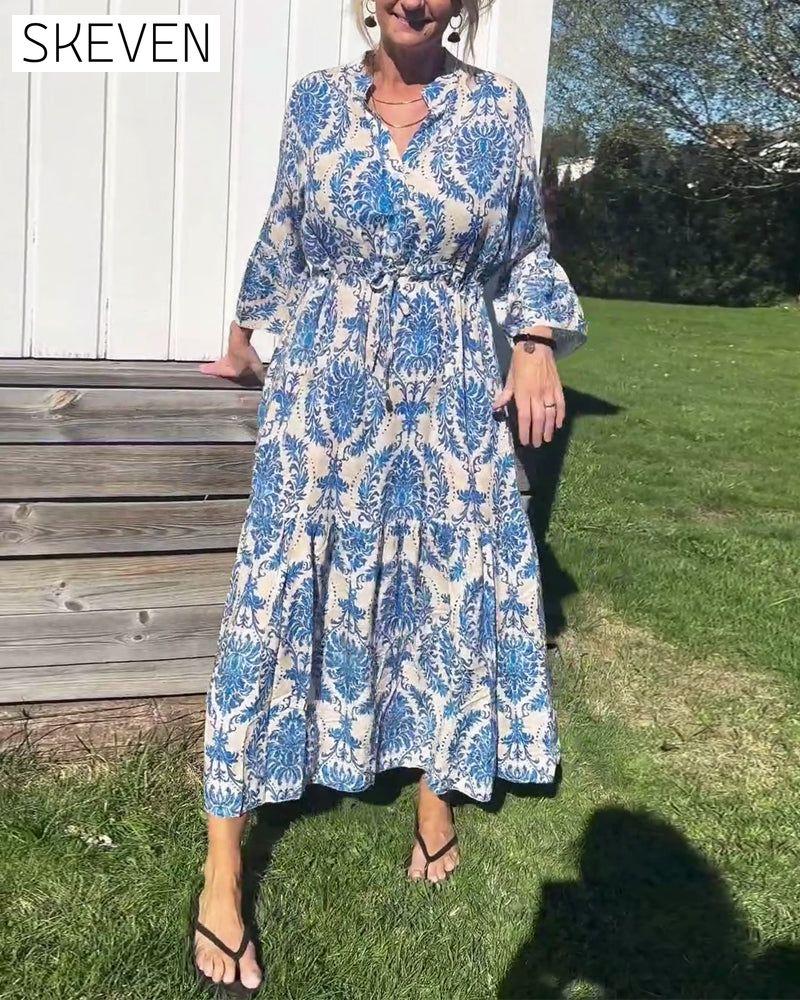 Bedrucktes Kleid mit Glockenärmeln und Kordelzug