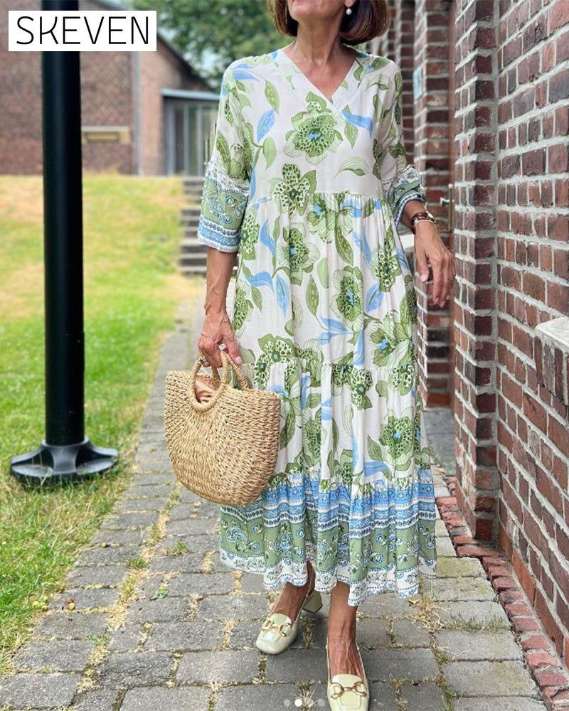 Elegantes Kleid mit Blumenmuster und V-Ausschnitt