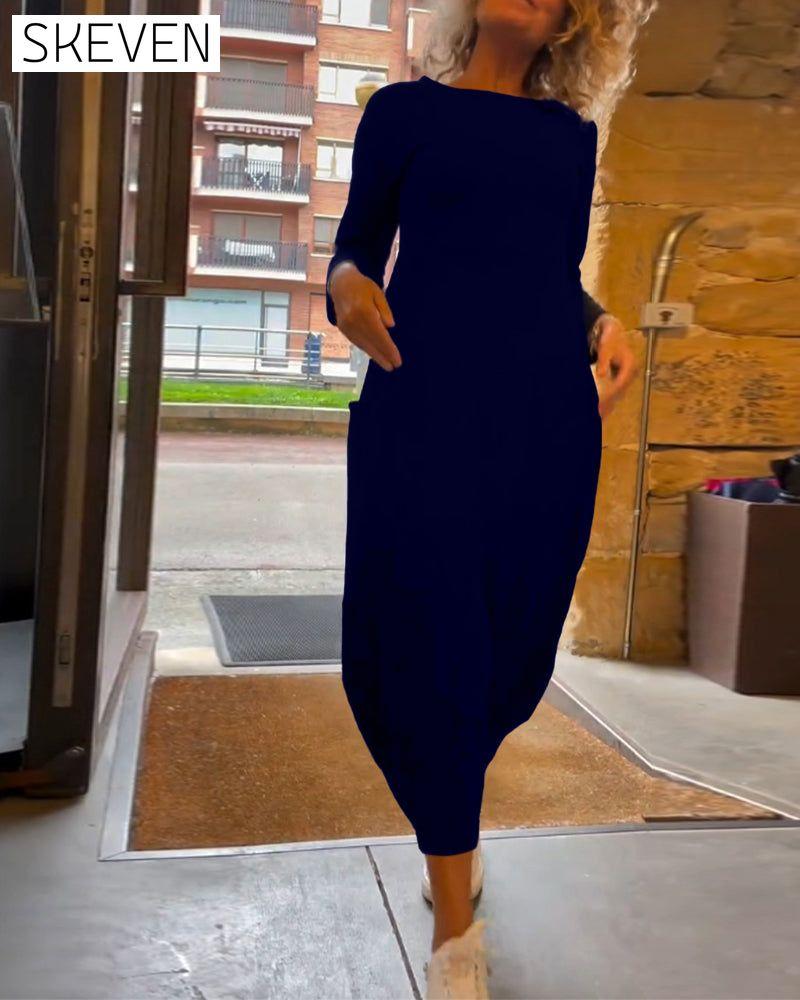 Solid color round neck long sleeve pocket dress