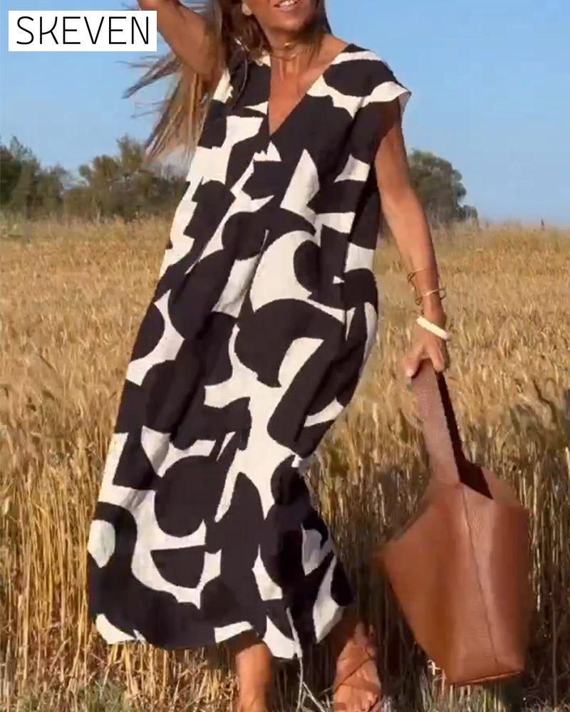 bedrucktes Kleid mit V-Ausschnitt