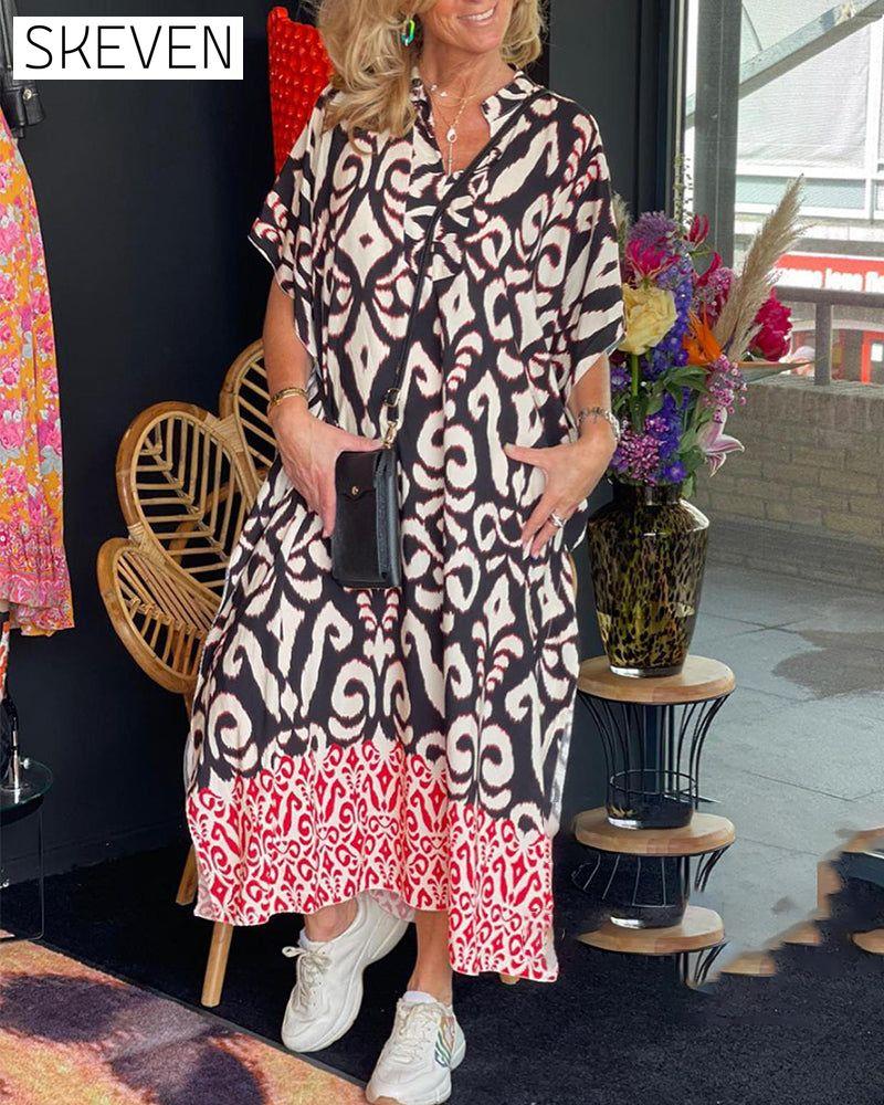Bedrucktes Kleid mit V-Ausschnitt