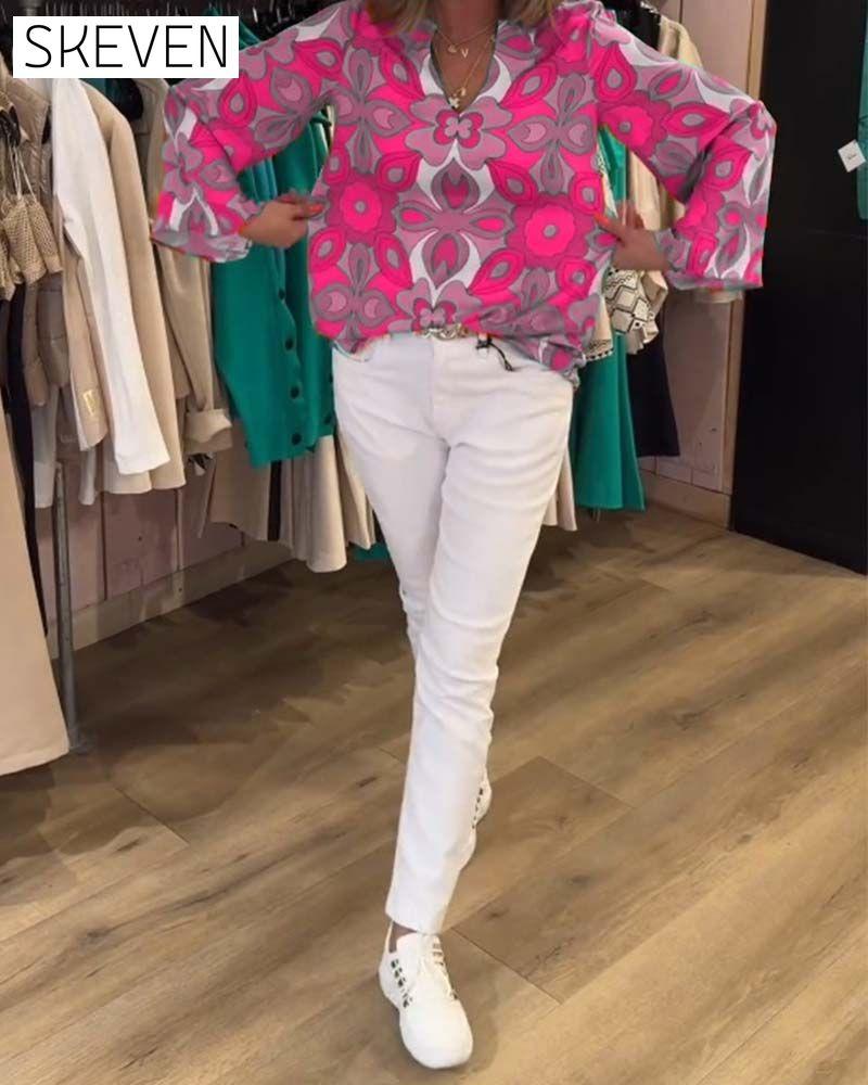Lockere und vielseitige bedruckte Bluse