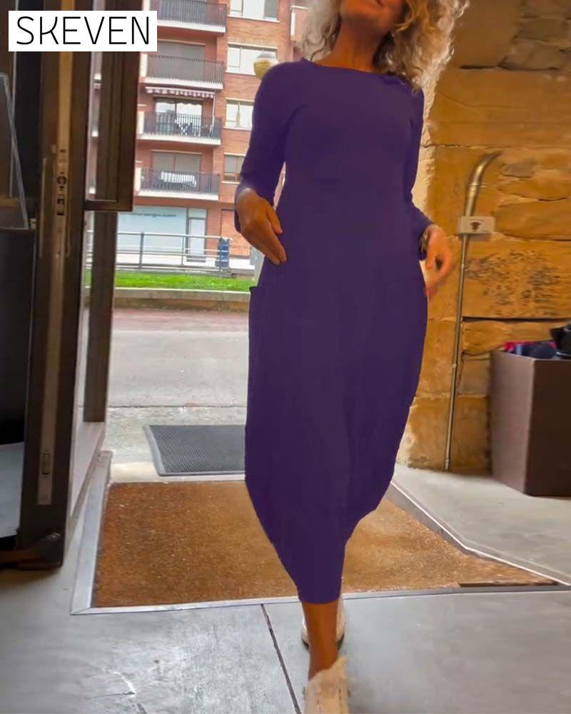 Solid color round neck long sleeve pocket dress