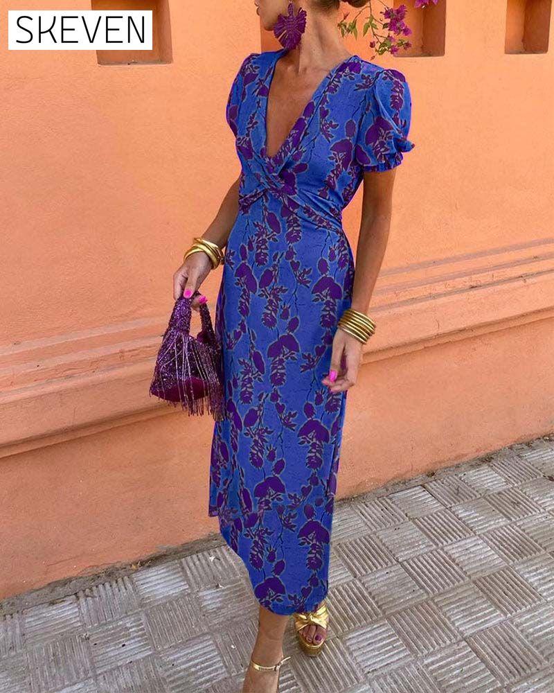 Elegantes A-Linien-Kleid mit Blätterprint, tiefem V-Ausschnitt und Puffärmeln