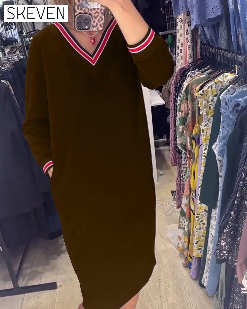Robe élégante à col en V avec poches