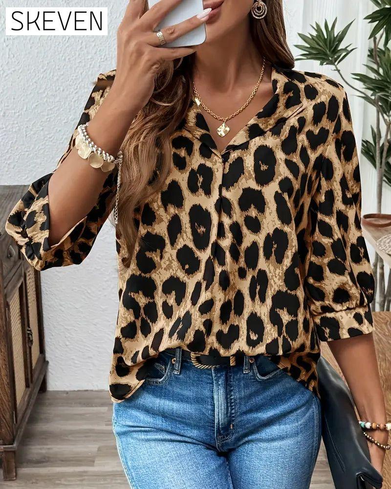 Halbärmelige, lockere Bluse mit Leopardenmuster