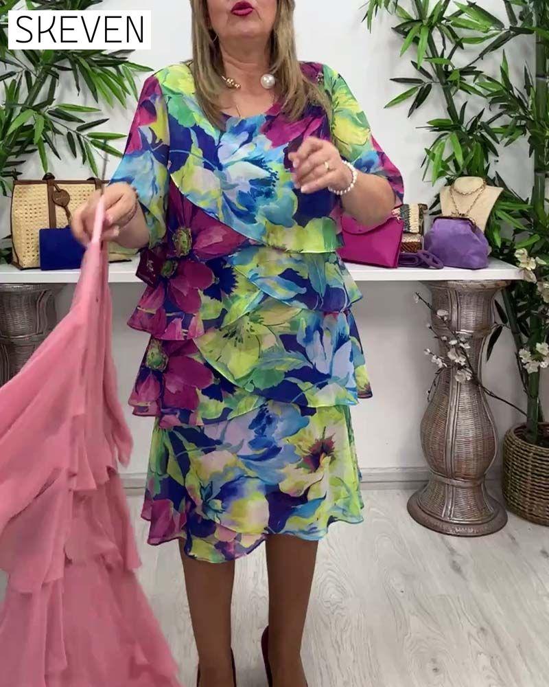 Kleid mit Blumenmuster, Rundhalsausschnitt und Rüschen an den halben Ärmeln