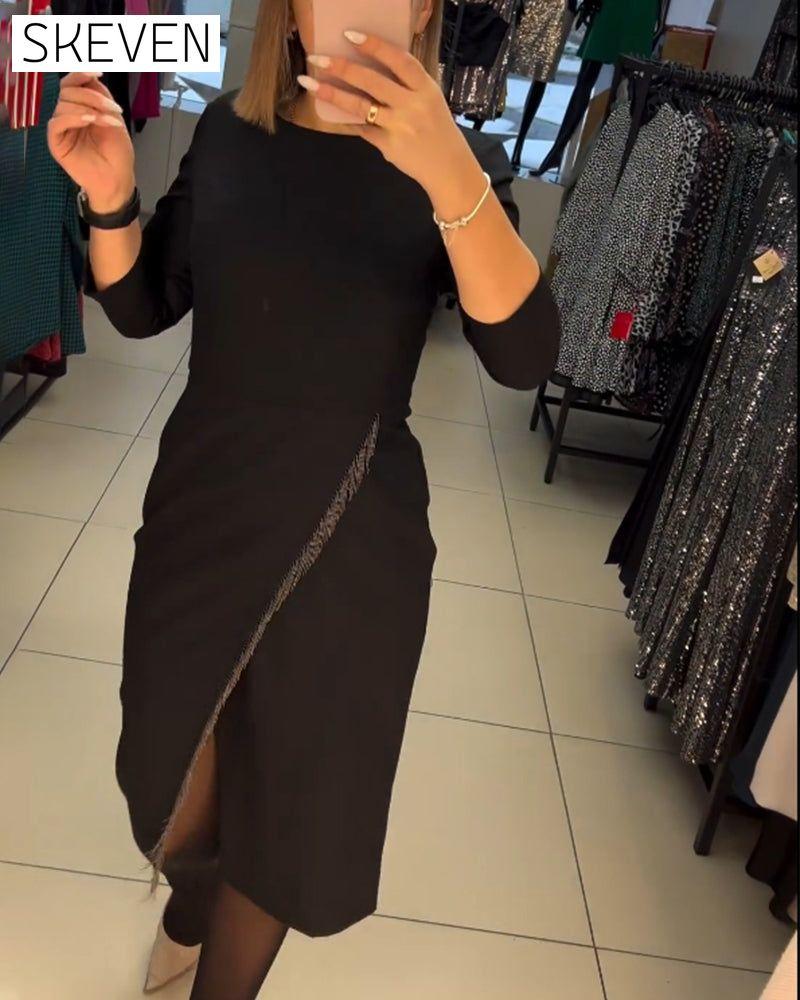 Robe à col rond et fente oblique