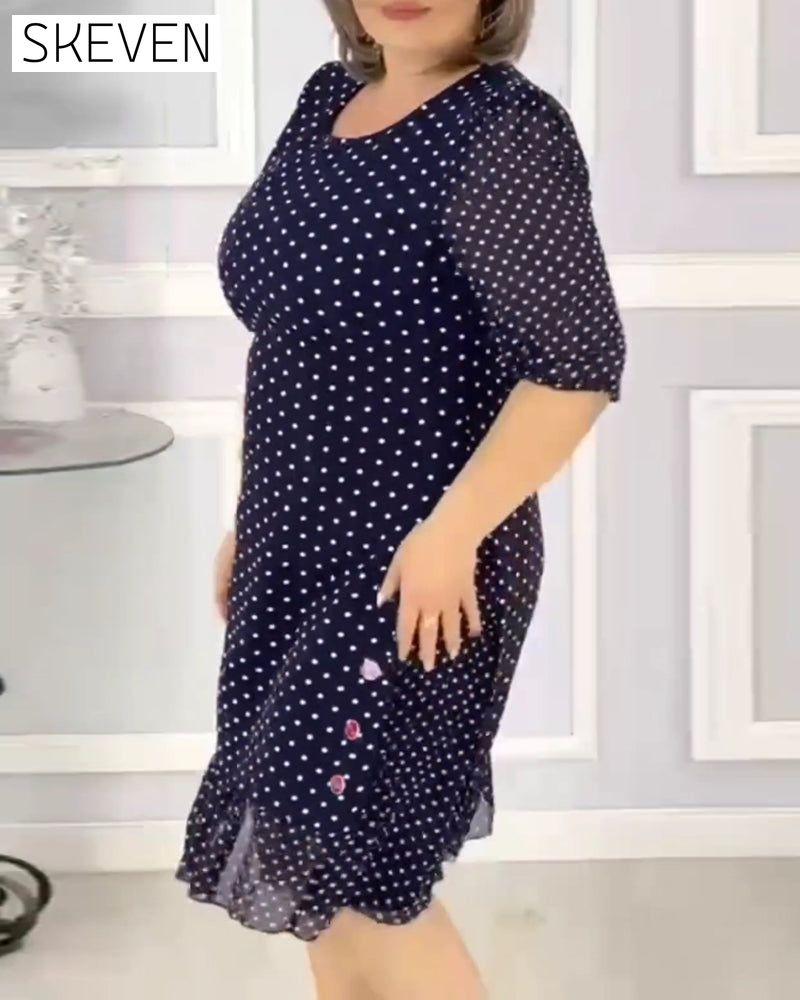 Robe élégante à manches courtes et imprimé à pois