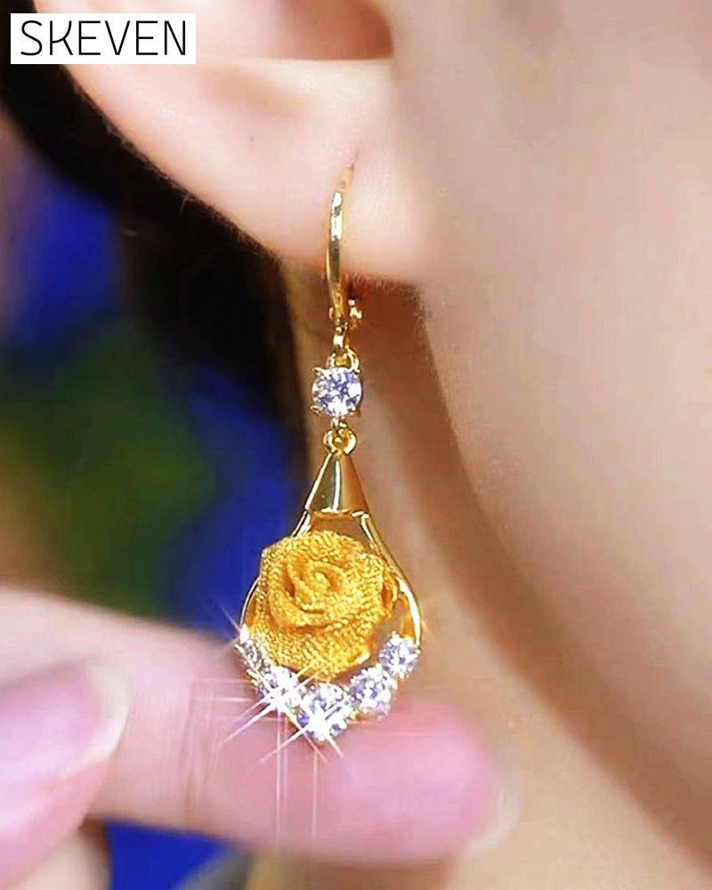 Elegante Netzohrringe mit Rosenmotiv