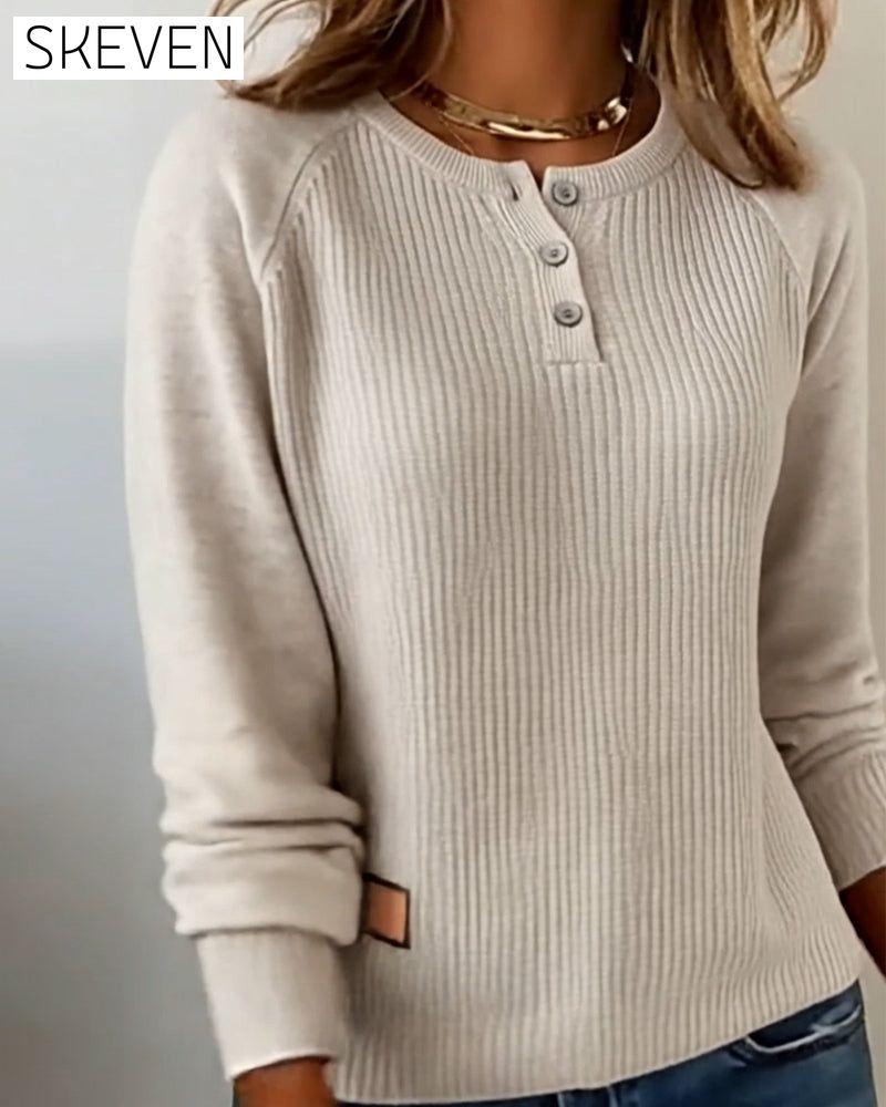 Stilvoller Pullover mit Raglanärmeln und Knopfleiste