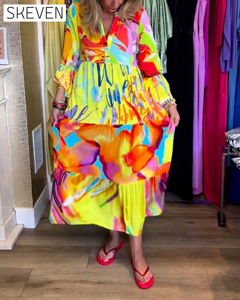 Bedrucktes Kleid mit ausgestellten Ärmeln