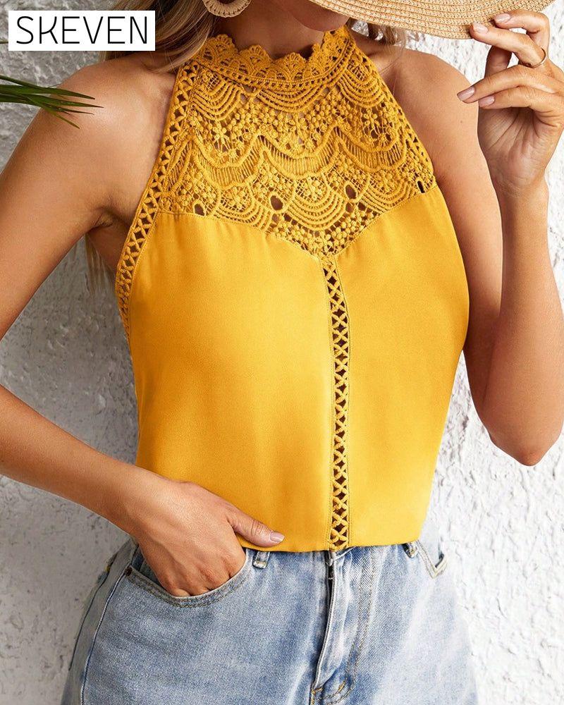 Gilet sans manches en dentelle ajourée couleur unie