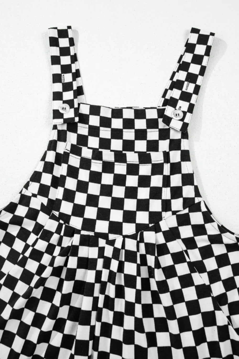 Jumpsuit mit Karomuster, Taschen und weitem Bein