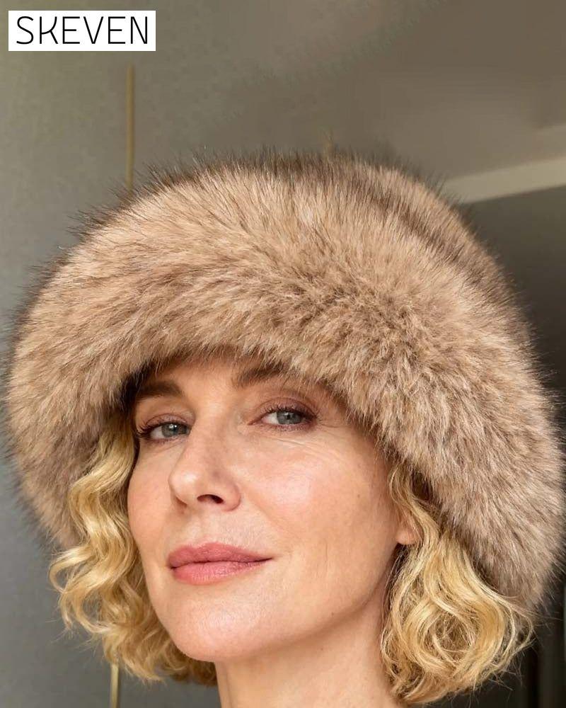 Bequeme und elegante Wintermütze mit Fell