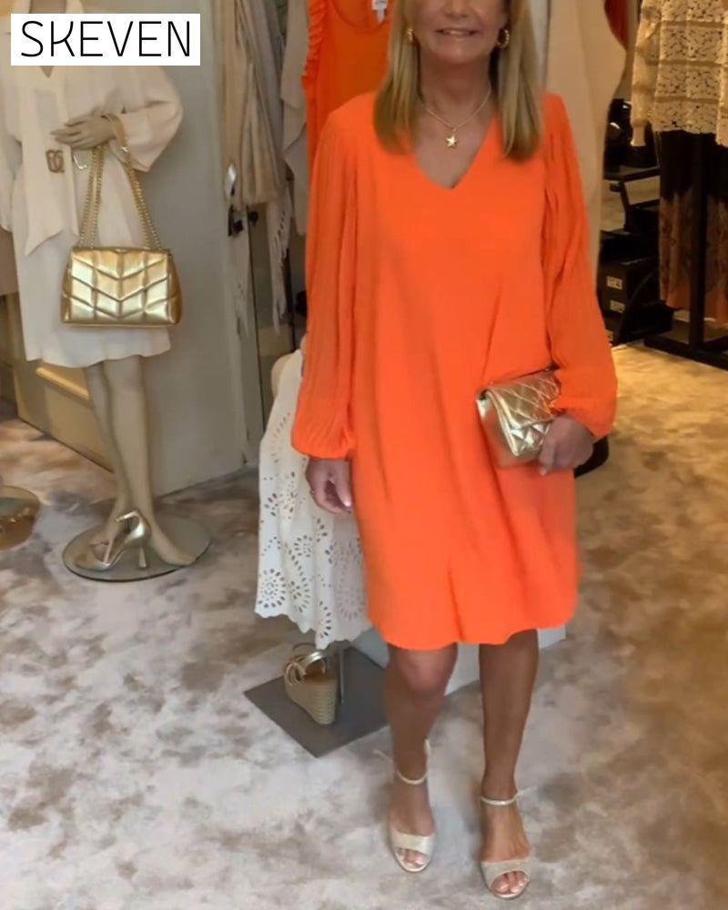 einfarbiges Kleid mit Laternenärmeln und V-Ausschnitt