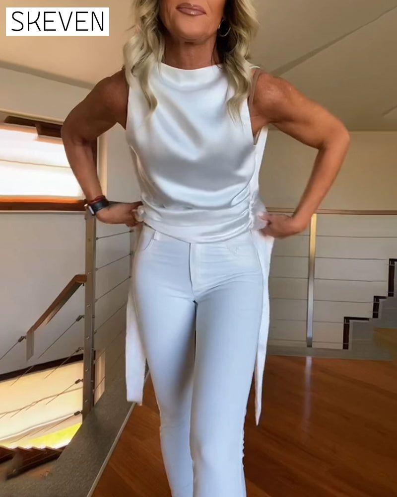 Sleeveless pleated knotted solid top