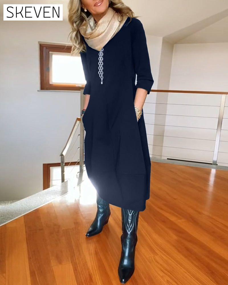 Elegantes, einfarbiges Kleid mit Rundhalsausschnitt und Taschen