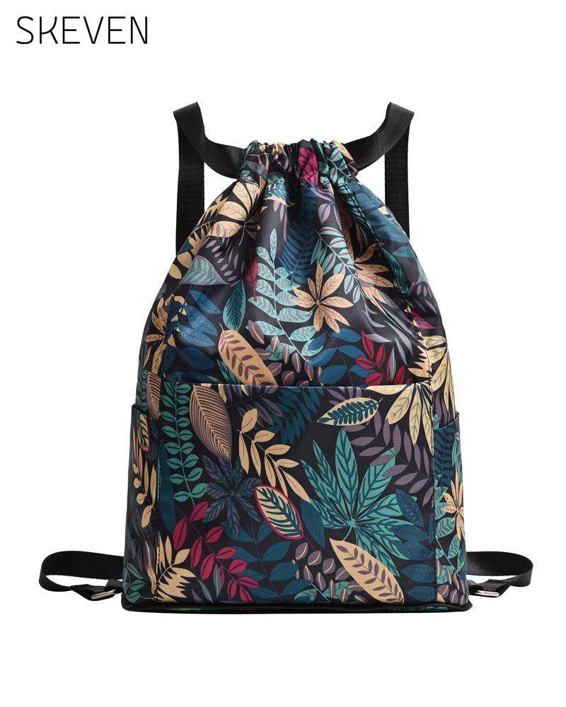 Schultertasche im Ethno-Stil mit Kordelzug