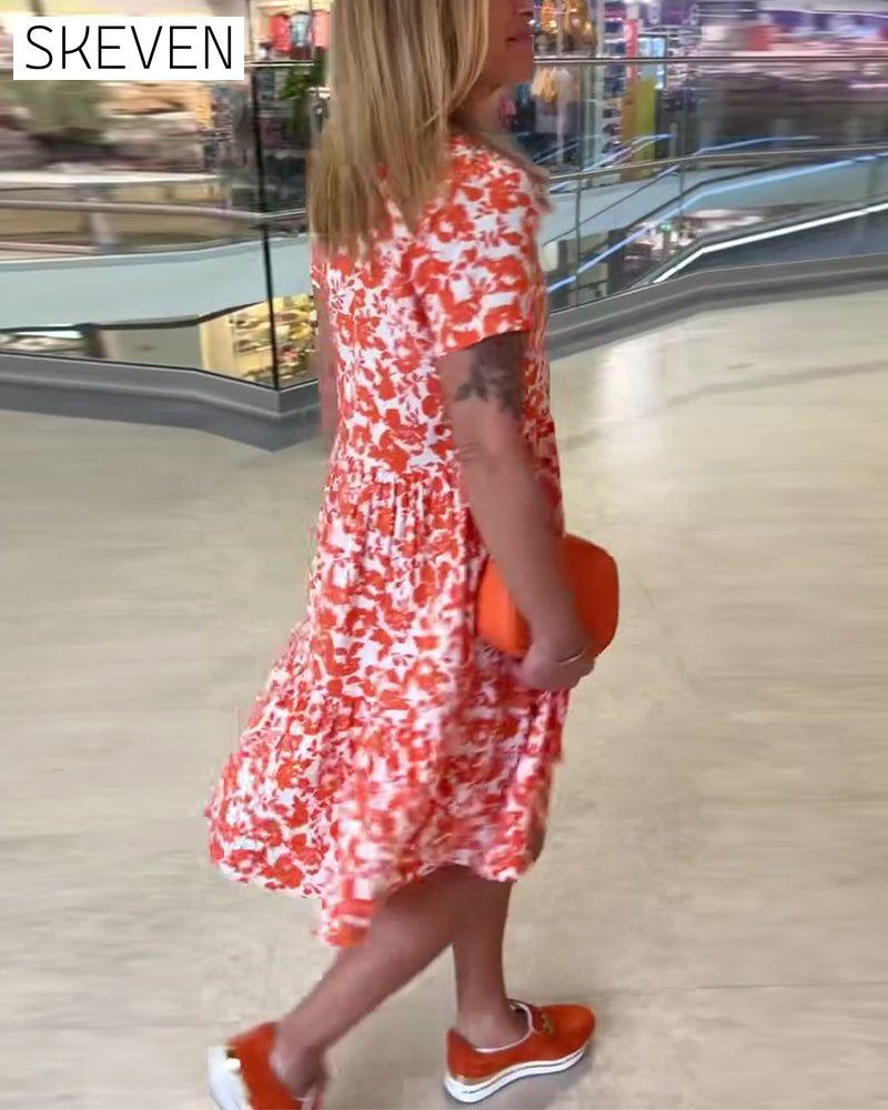 Kurzärmeliges geblümtes Midikleid