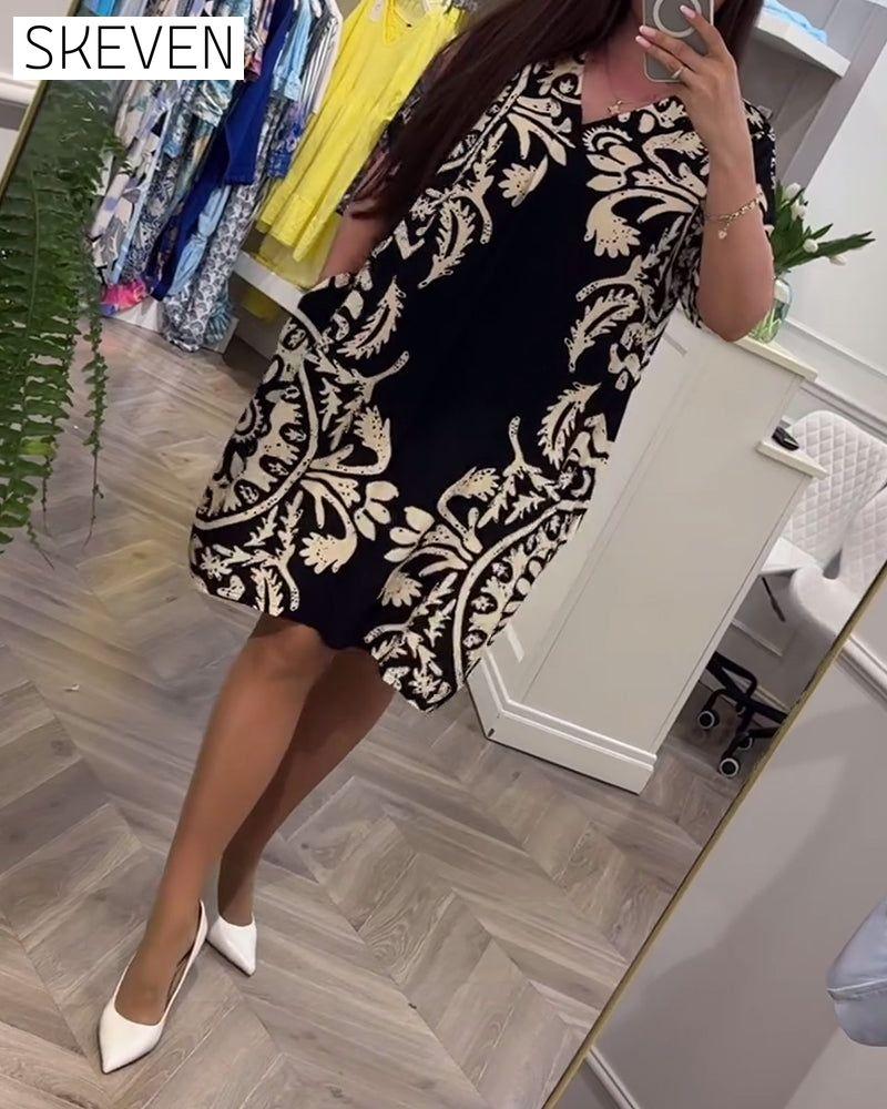 Robe ample rétro imprimée à col en V et manches courtes