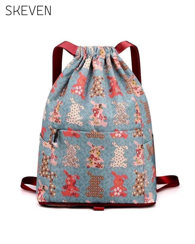 Schultertasche im Ethno-Stil mit Kordelzug