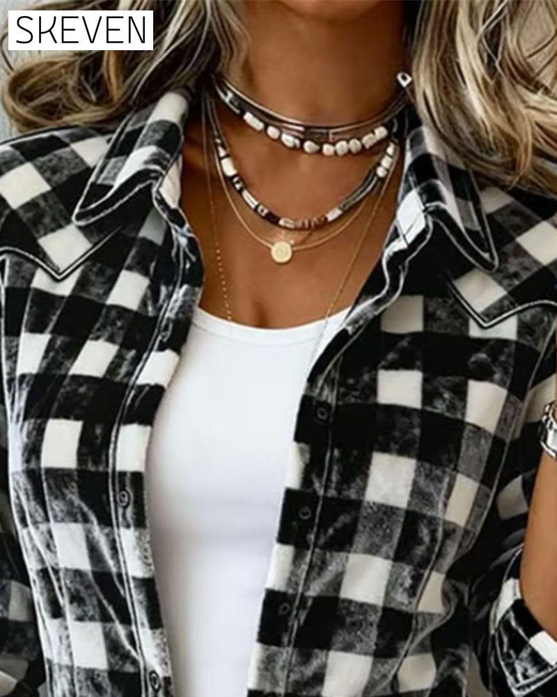 Chemise à carreaux en velours à revers