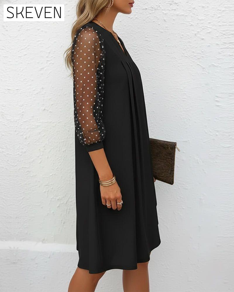 Figurformendes Kleid aus Mesh mit V-Ausschnitt