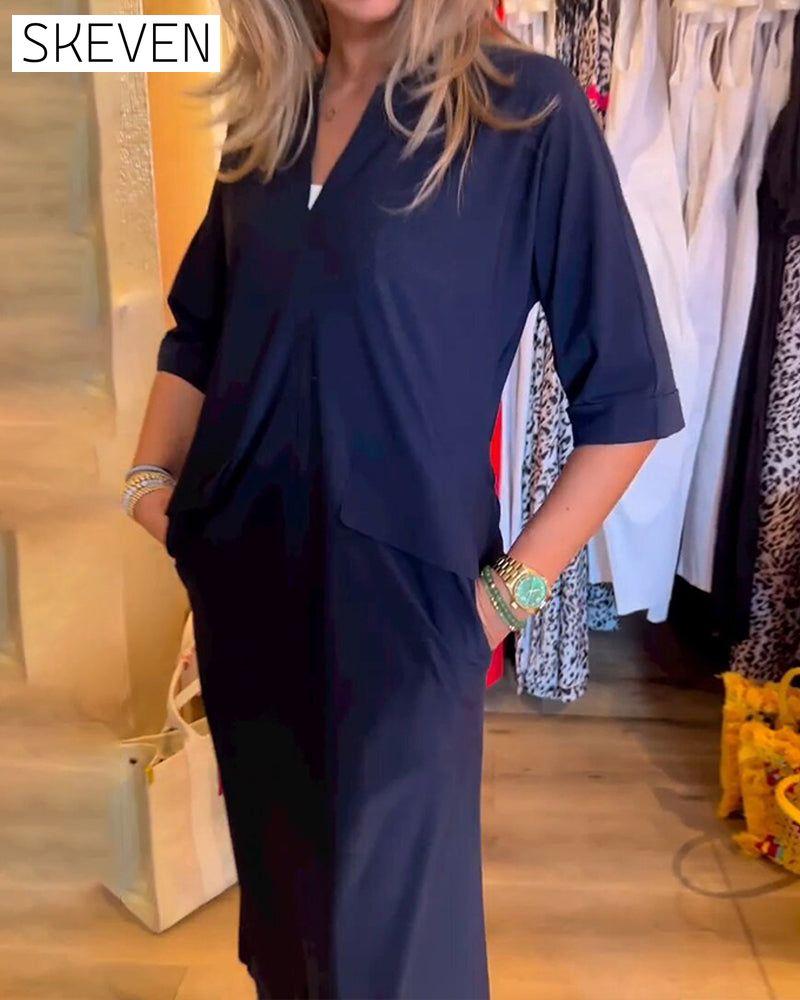 Kleid mit V-Ausschnitt und Taschen