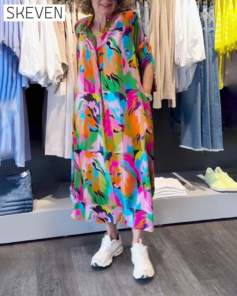 Kleid mit farbigem Aufdruck und Taschen