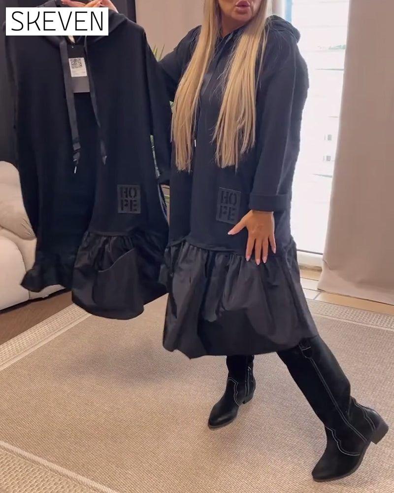 Langärmeliges, locker sitzendes Kapuzenkleid