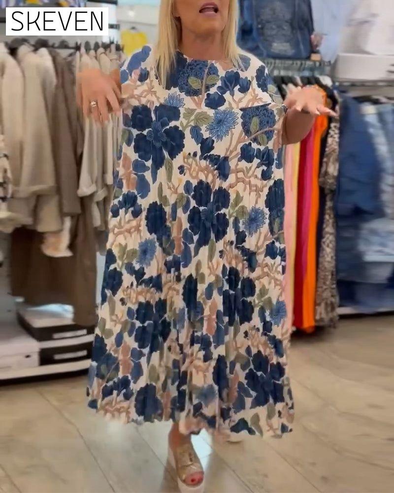 Elegantes Kleid mit Rundhalsausschnitt und Blumenmuster