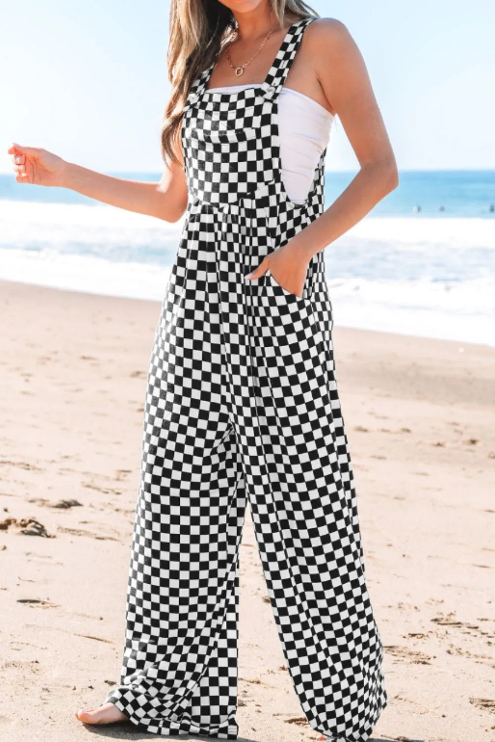 Jumpsuit mit Karomuster, Taschen und weitem Bein