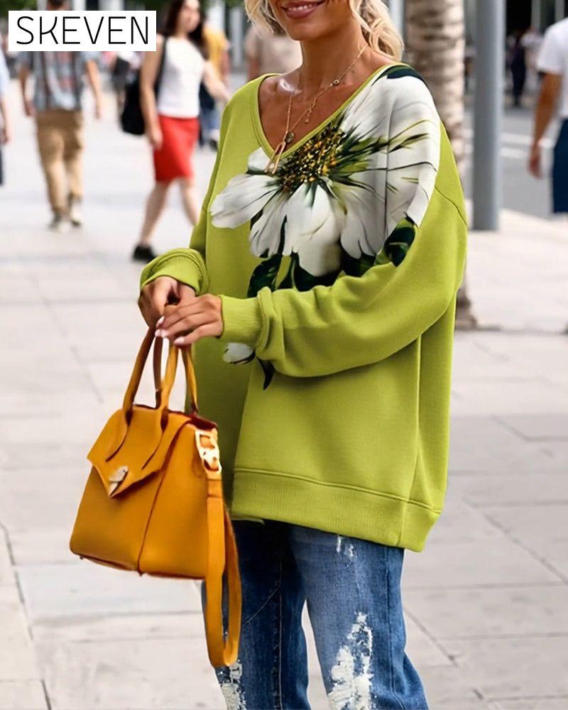 Bedrucktes Sweatshirt mit V-Ausschnitt und lockerer Passform