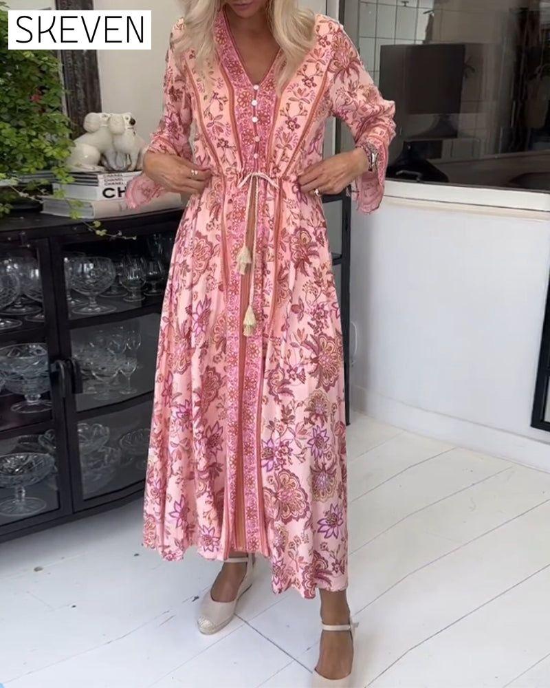Elegantes bedrucktes Kleid mit V-Ausschnitt, Knopfleiste und Kordelzug