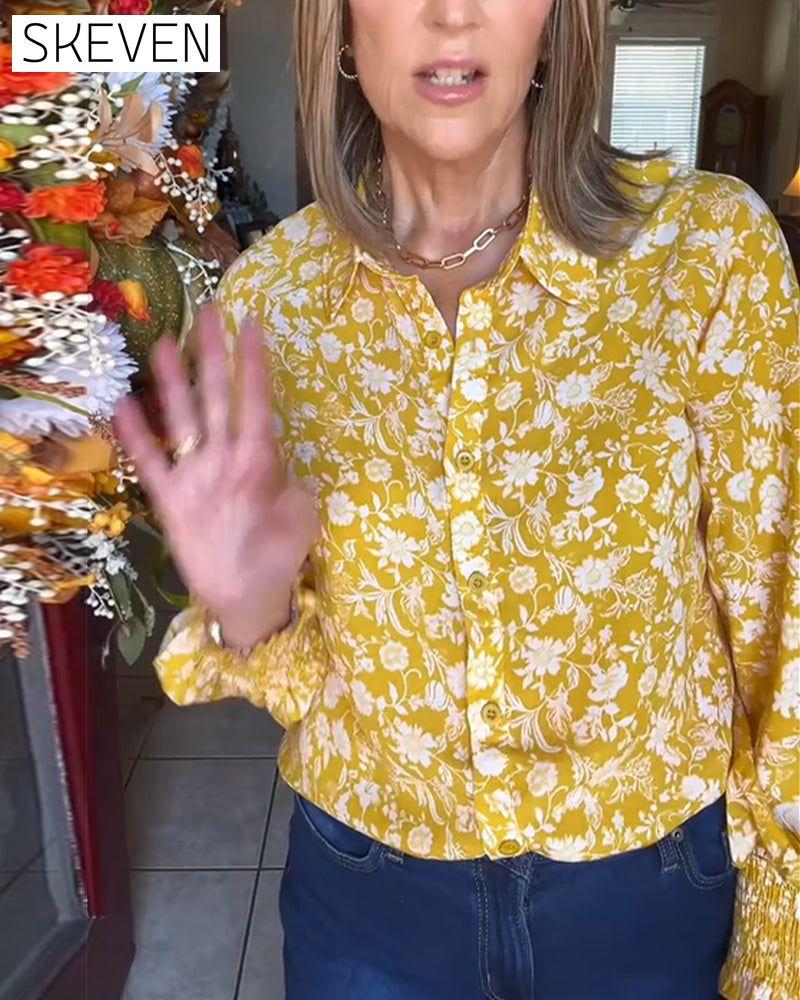 Bluse im Retro-Stil mit Knöpfen und Blumenmuster